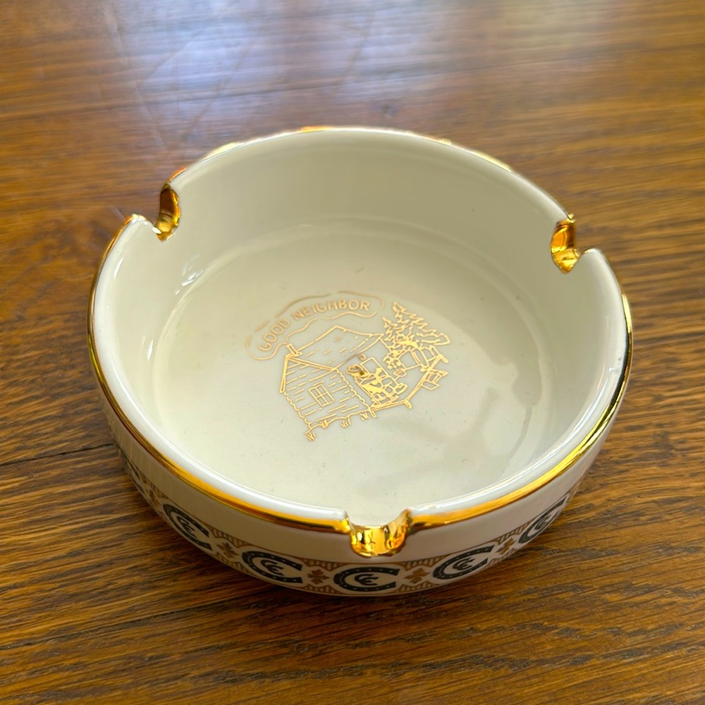 Off White Ceramic Ashtray with Gold Accents and logo